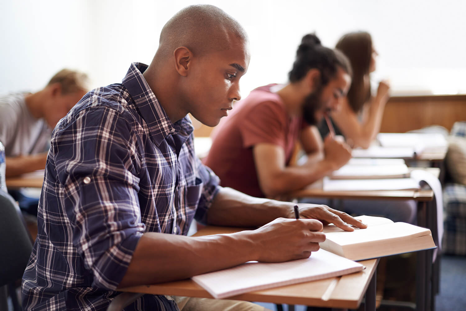Man-taking-exam Man-taking-exam